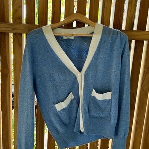 Sandro blue wool and cashmere cardigan with nacre buttons detail.